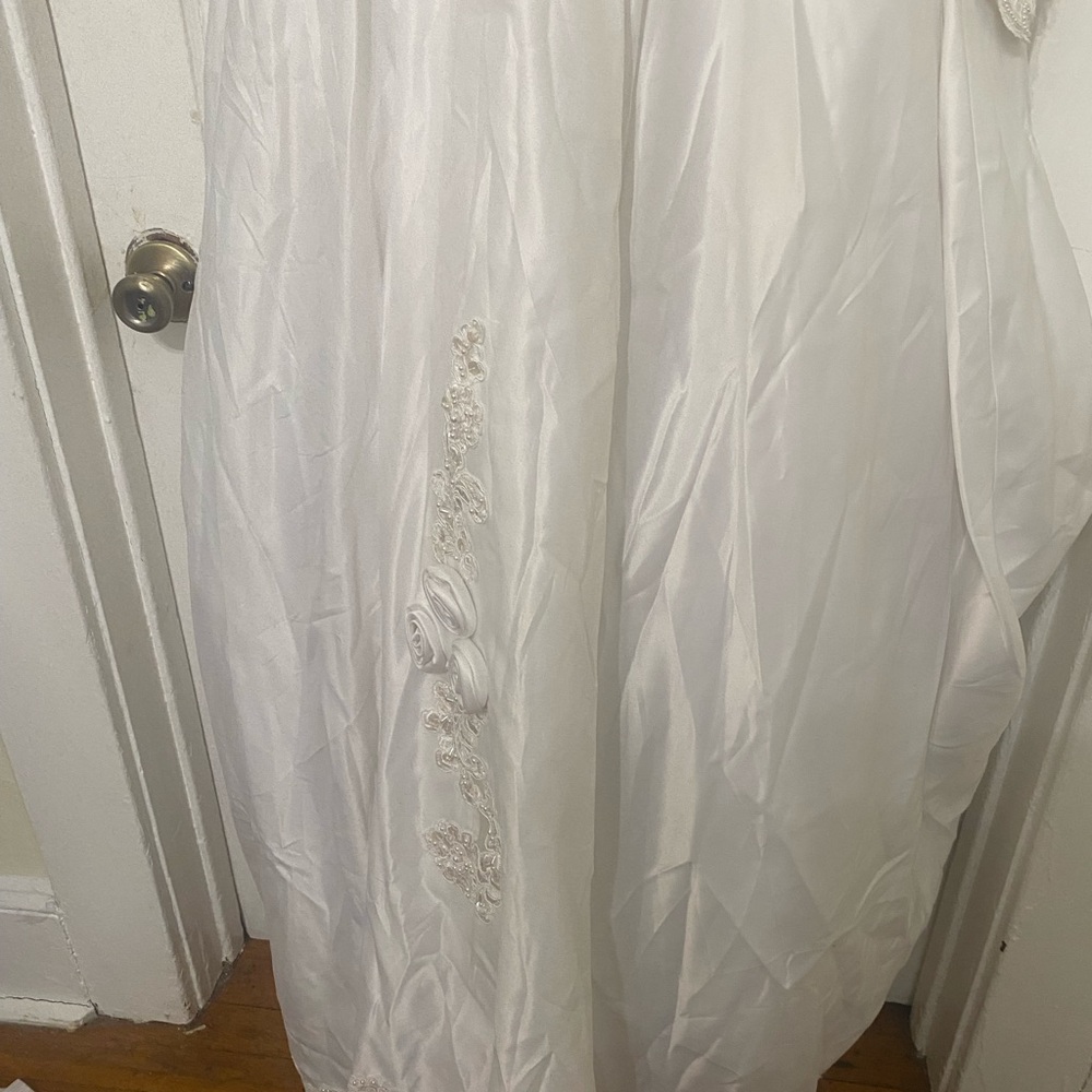 White wedding dress size 12.  Accented with pearls.